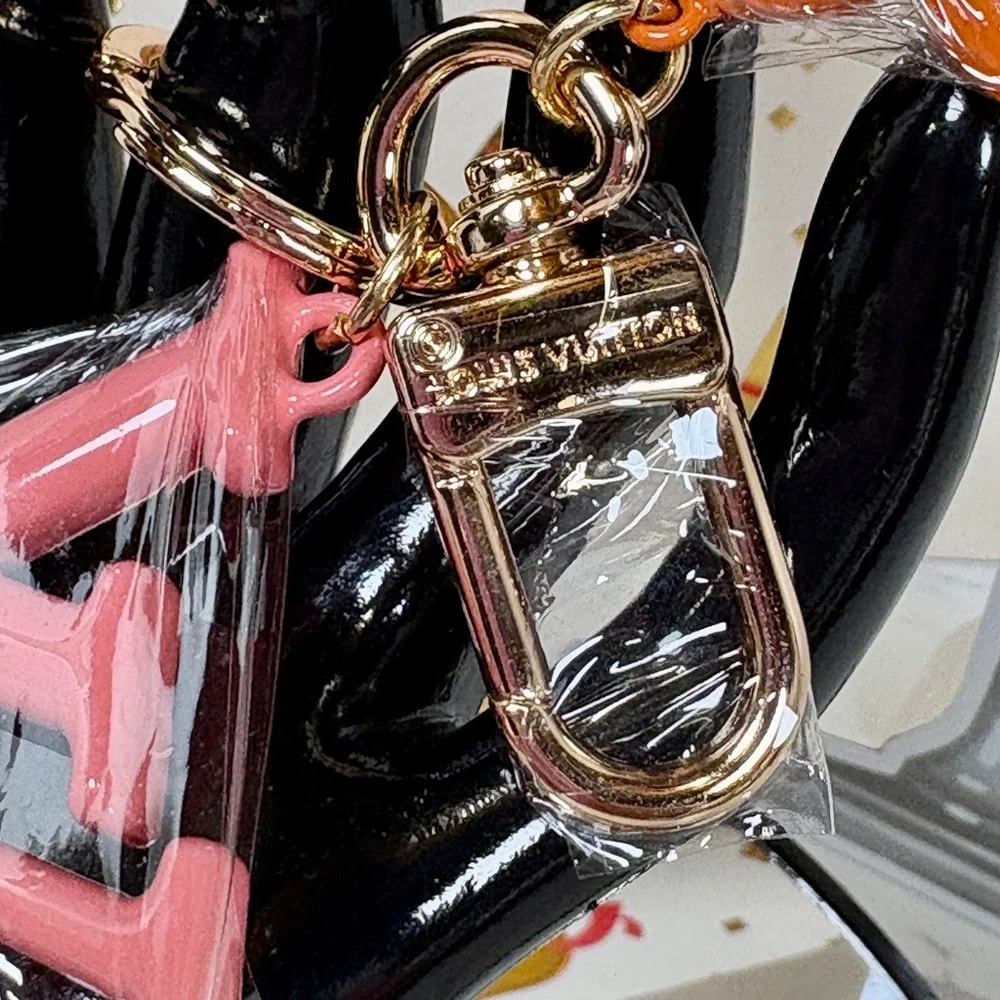 A-1DC-41: BAG CHARM/ KEYCHAIN: Pinkish-Coral, Orange and Golden Accents, NWOT